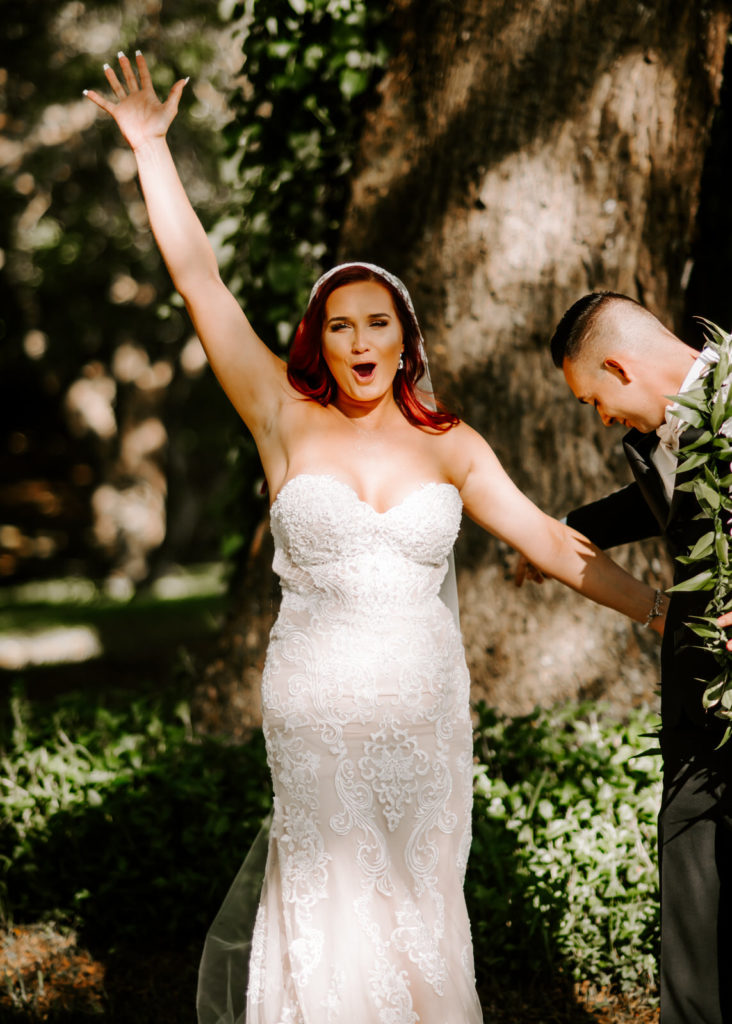 bride cheering after saying their vows