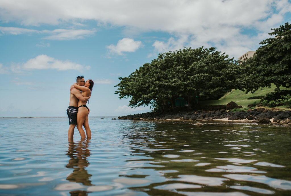 Couple kissing in the water