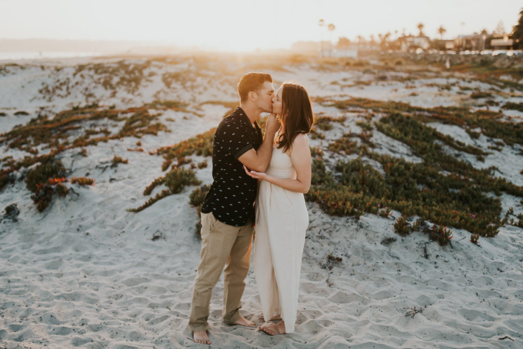Couple kissing on the beach